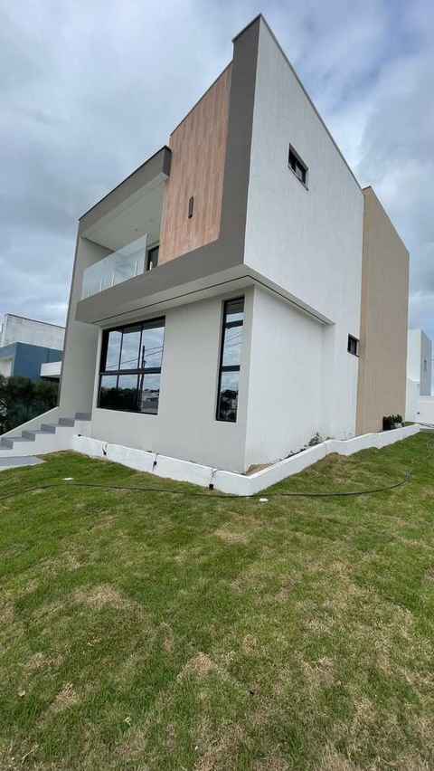 Residência térrea · Parkville · Pé-direito alto com detalhe amadeirado