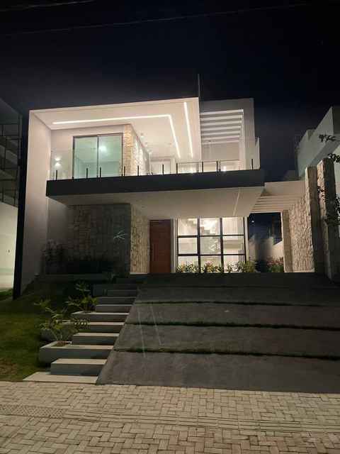 Residência duplex · Terras Alphaville · Frisos de LED e pedra natural